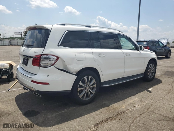 2016 Mercedes-Benz GL with VIN 4JGDF6EE7GA629942, listed as a Copart auction lot 61927684 with 125,256 mi miles and Salvage Title. Bid and sale history available at carsss.com. Image 3.