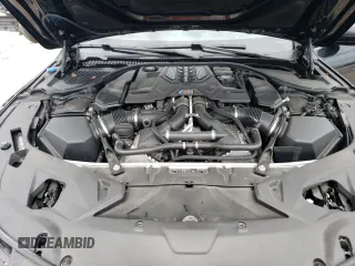 2021 BMW M8 z VIN WBSGV0C08MCF20118, wystawiony jako Copart lot #54980043 z przebiegiem 28 254 mil mil oraz . Historia ofert i sprzedaży dostępna na DreamBid. Obrazek 11.