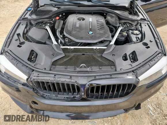 2018 BMW 5 Series 540i xDrive with VIN WBAJE7C52JWD52730, listed as a Copart auction lot 60297425 with 104,208 mi miles and Salvage title. Bid and sale history available at DreamBid. Image 11.