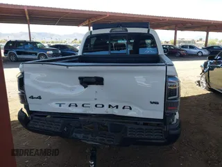 2016 Toyota Tacoma SR with VIN 5TFCZ5ANXGX028464, listed as a IAAI auction lot 41834385 with 124,407 mi miles and . Bid and sale history available at DreamBid. Image 15.