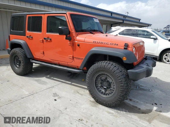 2015 Jeep Wrangler Unlimited Rubicon with VIN 1C4BJWFG9FL654550, listed as a Copart auction lot 49306965 with 64,911 mi miles and Salvage Title. Bid and sale history available at carsss.com. Image 4.