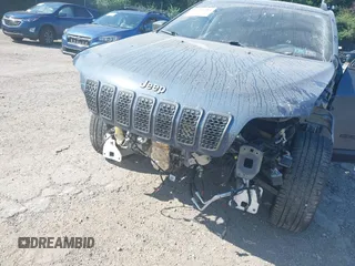 2021 Jeep Cherokee Latitude Lux z VIN 1C4PJMMX8MD205199, wystawiony jako IAAI lot #42556584 z przebiegiem 32 787 mil mil oraz . Historia ofert i sprzedaży dostępna na DreamBid. Obrazek 6.