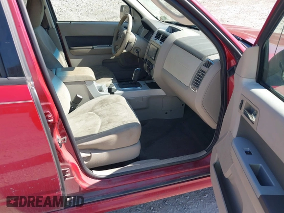 2011 Mercury Mariner with VIN 4M2CN8B77BKJ04817, listed as a IAAI auction lot 40493583 with 292,950 mi miles and . Bid and sale history available at DreamBid. Image 5.