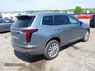 2022 Cadillac XT6 Premium Luxury z VIN 1GYKPDRS4NZ146284, wystawiony jako IAAI lot #42150678 z przebiegiem 28 890 mil mil oraz . Historia ofert i sprzedaży dostępna na DreamBid. Obrazek 4.