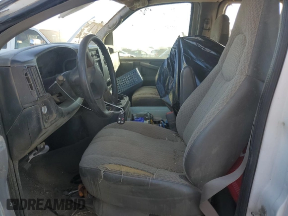 2005 Chevrolet Express Passenger with VIN 1GAHG39U851234497, listed as a Copart auction lot 77631364 with 173,891 mi miles and Salvage title. Bid and sale history available at DreamBid. Image 7.