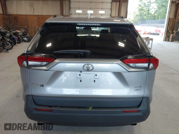 2021 Toyota RAV4 XLE with VIN 2T3P1RFV5MC180890, listed as a IAAI auction lot 42567858 with 56,961 mi miles and . Bid and sale history available at DreamBid. Image 15.