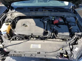 2016 Ford Fusion SE z VIN 3FA6P0HD7GR365174, wystawiony jako Copart lot #49579235 z przebiegiem 104 212 mil mil oraz Szkoda całkowita • Salvage title. Historia ofert i sprzedaży dostępna na DreamBid. Obrazek 11.