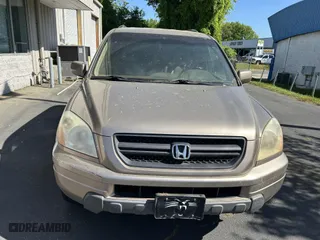 2004 Honda Pilot EX with VIN 2HKYF18574H592240, listed as a IAAI auction lot 42062516 with 182,108 mi miles. Bid and sale history available at carsss.com. Image 6.