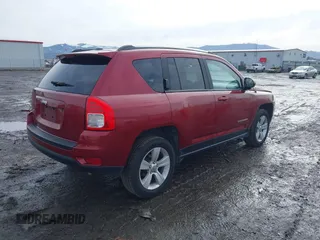 2013 Jeep Compass Sport with VIN 1C4NJDBB2DD207609, listed as a IAAI auction lot 41653746 with 121,697 mi miles. Bid and sale history available at carsss.com. Image 4.