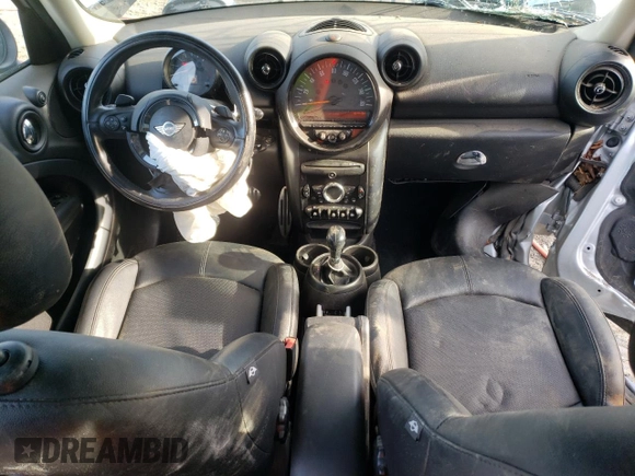 2016 MINI Countryman S with VIN WMWZC5C55GWU22112, listed as a Copart auction lot 82132654 with 60,210 mi miles and Salvage Title. Bid and sale history available at DreamBid. Image 8.