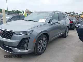 2025 Cadillac XT6 FWD Premium Luxury with VIN 1GYKPCRS4SZ119978, listed as a IAAI auction lot 41877109 with 13,579 mi miles. Bid and sale history available at carsss.com. Image 19.
