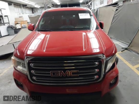 2019 GMC Canyon 2WD SLE z VIN 1GTG5CENXK1137028, wystawiony jako IAAI lot #42374821 z przebiegiem 91 228 mil mil oraz . Historia ofert i sprzedaży dostępna na DreamBid. Obrazek 12.