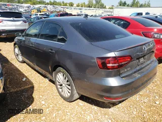 2016 Volkswagen Jetta Sedan 1.8T SEL with VIN 3VWL17AJ5GM205618, listed as a Copart auction lot 50642314 with 99,219 mi miles and Clean Title. Bid and sale history available at carsss.com. Image 3.