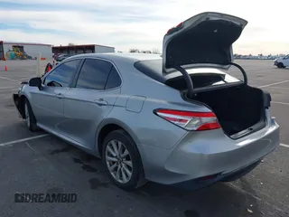 2019 Toyota Camry LE with VIN 4T1B11HK7KU803624, listed as a IAAI auction lot 41589107 with 169,863 mi miles and . Bid and sale history available at DreamBid. Image 3.