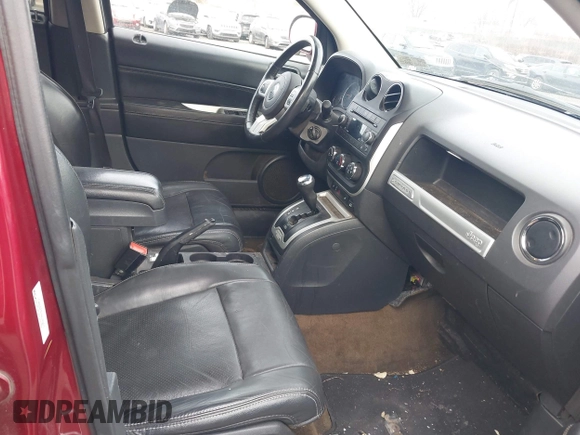 2016 Jeep Compass High Altitude Edition with VIN 1C4NJDEB1GD729471, listed as a IAAI auction lot 41616976 with 124,385 mi miles. Bid and sale history available at carsss.com. Image 5.
