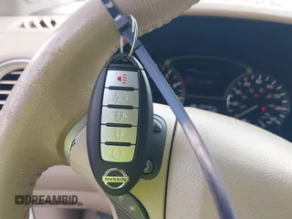 2014 Nissan Pathfinder Platinum with VIN 5N1AR2MN0EC646541, listed as a IAAI auction lot 42680665 with 203,487 mi miles and . Bid and sale history available at DreamBid. Image 11.