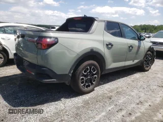 2023 Hyundai Santa Cruz SEL with VIN 5NTJBDAE9PH054993, listed as a Copart auction lot 57294935 with 46,527 mi miles and Salvage title. Bid and sale history available at DreamBid. Image 3.