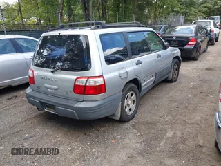 2002 Subaru Forester L with VIN JF1SF63572H736509, listed as a IAAI auction lot 42802863 with 241,678 mi miles and . Bid and sale history available at DreamBid. Image 4.