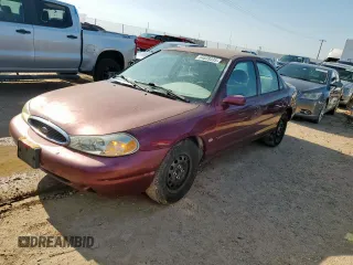 1999 Ford Contour LX with VIN 1FAFP66L2XK167281, listed as a Copart auction lot 64839335 with 256,227 mi miles and Clean title. Bid and sale history available at DreamBid. Image 1.