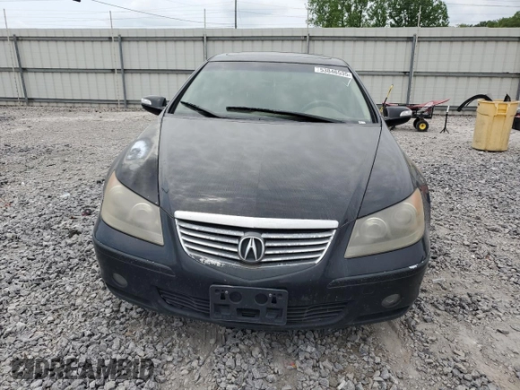 2006 Acura RL z VIN JH4KB16586C010597, wystawiony jako Copart lot #53846535 z przebiegiem 212 219 mil mil oraz Szkoda całkowita • Salvage title. Historia ofert i sprzedaży dostępna na DreamBid. Obrazek 5.