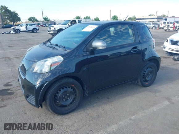 2013 Scion iQ with VIN JTNJJXB04DJ024322, listed as a IAAI auction lot 42618525 with 154,559 mi miles and . Bid and sale history available at DreamBid. Image 2.