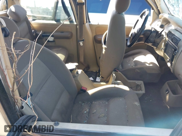 2004 Ford Explorer Sport Trac XLS z VIN 1FMZU67K74UC30067, wystawiony jako IAAI lot #41680436 z przebiegiem Nie podano mil oraz . Historia ofert i sprzedaży dostępna na DreamBid. Obrazek 5.