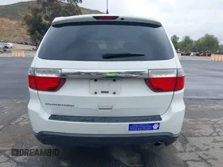 2013 Dodge Durango SXT z VIN 1C4RDHAG7DC694986, wystawiony jako IAAI lot #42181381 z przebiegiem 170 669 mil mil oraz . Historia ofert i sprzedaży dostępna na DreamBid. Obrazek 16.