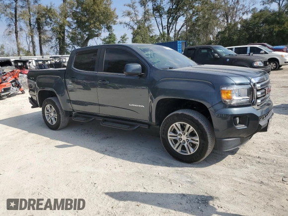 2019 GMC Canyon 4WD SLE with VIN 1GTG6CEN1K1129624, listed as a Copart auction lot 44106575 with 106,734 mi miles and Salvage Title. Bid and sale history available at carsss.com. Image 4.