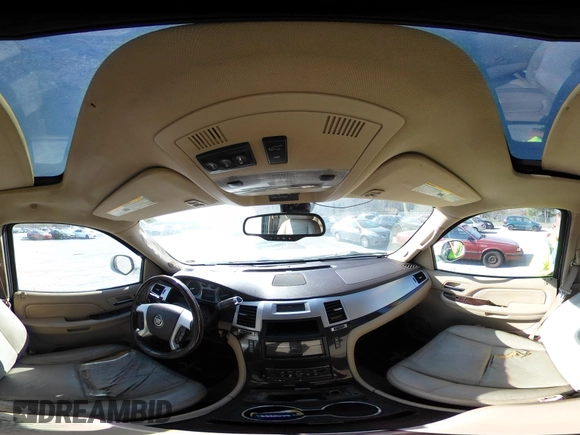 2009 Cadillac Escalade z VIN 1GYFK53219R121847, wystawiony jako IAAI lot #41818934 z przebiegiem 132 293 mil mil oraz . Historia ofert i sprzedaży dostępna na DreamBid. Obrazek 23.