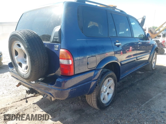 2003 Suzuki XL7 Touring z VIN JS3TX92V234104722, wystawiony jako IAAI lot #41994253 z przebiegiem 185 553 mil mil oraz . Historia ofert i sprzedaży dostępna na DreamBid. Obrazek 4.