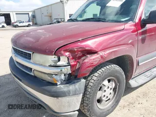 2003 Chevrolet Suburban LT with VIN 1GNEC16Z13J247753, listed as a IAAI auction lot 41501608 with 300,977 mi miles. Bid and sale history available at carsss.com. Image 6.