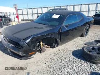 2014 Dodge Challenger R/T Plus z VIN 2C3CDYBT2EH274265, wystawiony jako IAAI lot #41845052 z przebiegiem 120 290 mil mil oraz . Historia ofert i sprzedaży dostępna na DreamBid. Obrazek 17.