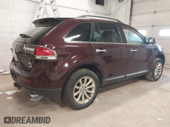 2011 Lincoln MKX with VIN 2LMDJ8JK5BBJ01386, listed as a IAAI auction lot 41983894 with 160,608 mi miles. Bid and sale history available at carsss.com. Image 4.