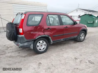 2005 Honda CR-V LX with VIN JHLRD68505C007375, listed as a IAAI auction lot 41979371 with 44,308 mi miles. Bid and sale history available at carsss.com. Image 4.