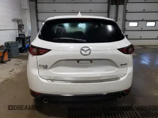 2020 Mazda CX-5 Grand Touring with VIN JM3KFBDM5L1851734, listed as a Copart auction lot 56729585 with 39,023 mi miles and Salvage title. Bid and sale history available at DreamBid. Image 6.