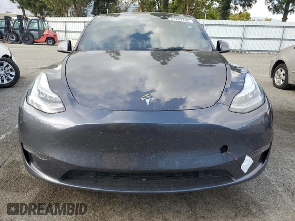 2021 Tesla Model Y Long Range with VIN 5YJYGDEE6MF200883, listed as a Copart auction lot 51707405 with 59,820 mi miles and Salvage Title. Bid and sale history available at DreamBid. Image 11.