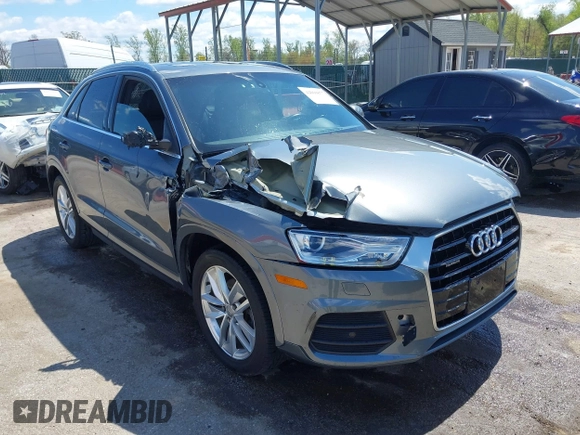 2017 Audi Q3 Premium Plus z VIN WA1JCCFS5HR003127, wystawiony jako IAAI lot #42060877 z przebiegiem 78 881 mil mil oraz . Historia ofert i sprzedaży dostępna na DreamBid. Obrazek 1.