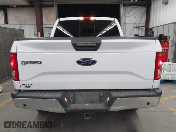 2015 Ford F-150 XLT with VIN 1FTEW1EGXFFB84269, listed as a IAAI auction lot 42565801 with 140,719 mi miles and . Bid and sale history available at DreamBid. Image 16.