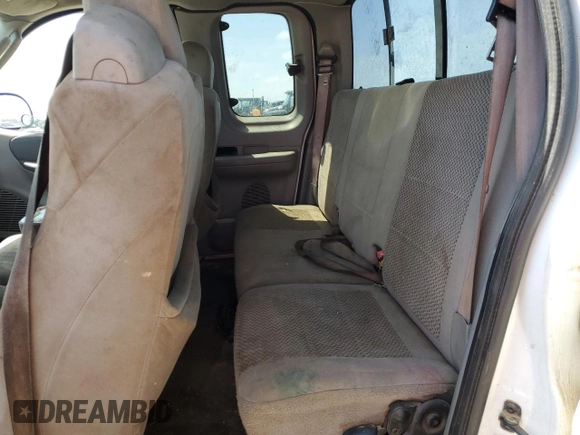 2003 Ford F-150 XL with VIN 2FTRX17213CA05950, listed as a Copart auction lot 54435115 with 310,503 mi miles and Salvage title. Bid and sale history available at DreamBid. Image 10.