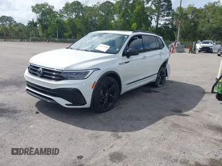 2024 Volkswagen Tiguan SE R-Line Black with VIN 3VVCB7AX6RM093792, listed as a IAAI auction lot 42117670 with 15,379 mi miles and . Bid and sale history available at DreamBid. Image 2.