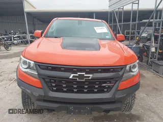 2019 Chevrolet Colorado 4WD ZR2 z VIN 1GCGTEEN9K1333740, wystawiony jako IAAI lot #41565621 z przebiegiem 71 484 mil mil oraz . Historia ofert i sprzedaży dostępna na DreamBid. Obrazek 12.