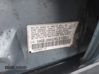 1999 Honda Civic EX z VIN 1HGEJ8643XL010821, wystawiony jako IAAI lot #41602036 z przebiegiem 165 139 mil mil oraz . Historia ofert i sprzedaży dostępna na DreamBid. Obrazek 9.