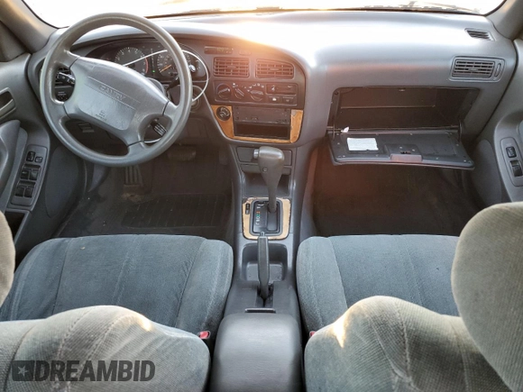 1992 Toyota Camry LE with VIN 4T1SK12E1NU127255, listed as a Copart auction lot 75554584 with 385,507 mi miles and Salvage Title. Bid and sale history available at carsss.com. Image 8.