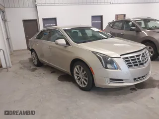 2015 Cadillac XTS Luxury with VIN 2G61N5S35F9220679, listed as a IAAI auction lot 41487320 with 133,308 mi miles. Bid and sale history available at carsss.com. Image 1.