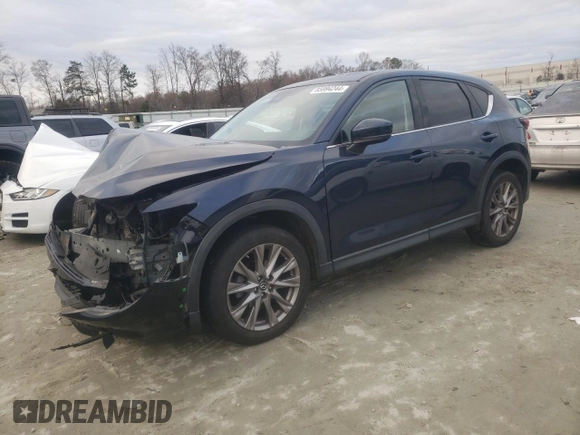 2020 Mazda CX-5 Grand Touring with VIN JM3KFADM4L1783968, listed as a Copart auction lot 85994244 with 89,074 mi miles and Salvage Title. Bid and sale history available at DreamBid. Image 1.