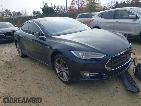 2014 Tesla Model S 60 with VIN 5YJSA1S12EFP42605, listed as a IAAI auction lot 40905031 with 68,155 mi miles and . Bid and sale history available at DreamBid. Image 1.