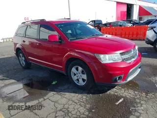 2012 Dodge Journey SXT z VIN 3C4PDDBG7CT298395, wystawiony jako IAAI lot #41682777 z przebiegiem 176 476 mil mil oraz . Historia ofert i sprzedaży dostępna na DreamBid. Obrazek 1.