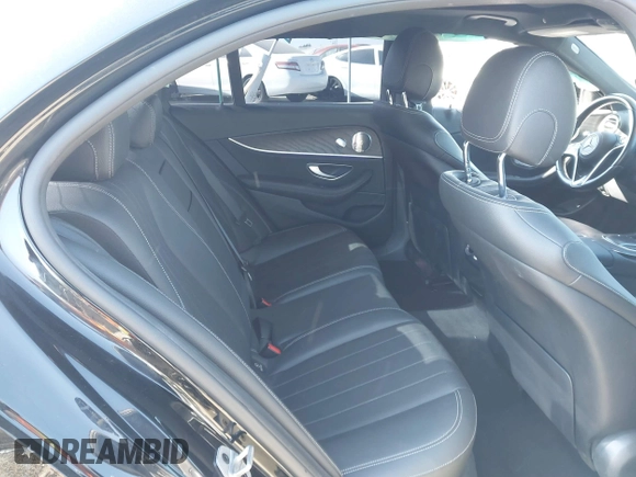 2021 Mercedes-Benz E-Class E 350 with VIN W1KZF8DB0MA889890, listed as a IAAI auction lot 41317094 with 63,075 mi miles. Bid and sale history available at carsss.com. Image 8.