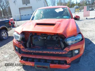 2016 Toyota Tacoma SR with VIN 3TMCZ5AN5GM031794, listed as a IAAI auction lot 41880146 with 87,287 mi miles and . Bid and sale history available at DreamBid. Image 6.