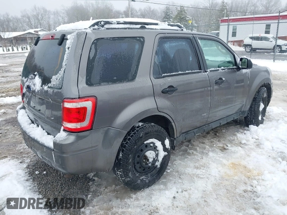 2012 Ford Escape XLS z VIN 1FMCU9C72CKA10130, wystawiony jako IAAI lot #41543233 z przebiegiem 168 552 mil mil oraz . Historia ofert i sprzedaży dostępna na DreamBid. Obrazek 4.